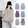 2025 Nuevo Bolso de Mano de Moda Ligero Mochila Pequeña Portátil Casual Mochila Multifuncional Casual Estilo Coreano