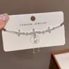 Diseño de moda nicho pulsera de lazo de diamantes llena de temperamento femenino exquisita Joker super brillante joyería de alta calidad al por mayor