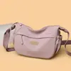 Tendencia transfronteriza bolsa ligera de nailon 2026 primavera bolso casual para mujer bolso de hombro de color liso bolso cruzado de compras para mujer