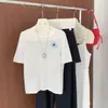 Nuevo estilo de verano algodón puro tejido estilo francés bloques de color versión coreana simple cuello redondo hombro normal manga corta camiseta top estampado para mujer