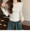 Venta al por mayor del fabricante Otoño e Invierno 92% Algodón Cuello Redondo Manga Larga Camiseta para Mujer Color Sólido Cintura Fruncida Adelgazante Versátil Top Corto