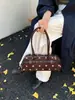 Bolsa de Ombro Poá Feminina Outono 2026 Nova Bolsa Transversal para o Trabalho Bolsa de Mão de Nicho Bolsa Baguete Simples de Ombro