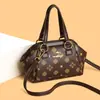 Bolso de mano con cierre de alta gama transfronterizo para mujer, diseño nuevo, elegante y sencillo, adecuado para madres de mediana edad, bolso de hombro y cruzado