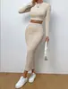 Ropa Europea y Americana 2025 Amazon Primavera Moda Casual Cuello Redondo Manga Larga Falda a la Cadera Traje Tejido