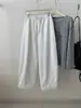 Pantalones jogger de cordón estilo minimalista coreano para mujer, versátiles y adelgazantes, con un tacto relajado, pantalones de pierna ancha con retazos, Otoño 2026