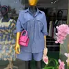 Moda Femenina Transfronteriza Europea y Americana Verano 2026 Nuevo Conjunto Casual de Camisa de Rayas Suelta con Bolsillos y Shorts de Cintura Alta
