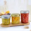 Fábrica Certificada ISO Atacado Transparente Selada Vidro Garrafa de Molho de Peixe Garrafa de Geleia Grau Alimentício Garrafa de Picles Pote de Picles