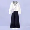 Conjunto moderno de dos piezas para niñas 2026: top con capucha de moda con diseño de dos piezas falso, combinado con pantalones vaqueros estilo coreano