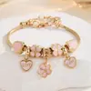 Pulsera de Cuentas DIY Corazón Rosa Dulce Flor con Colgante de Trébol, Pulsera de Hueso de Serpiente Ajustable para Niña Venta al por Mayor