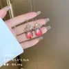 Exquisitos pendientes largos cortos con borlas incrustados de perlas y diamantes para mujer diseño de nicho de lujo ligero pendientes de lazo amor