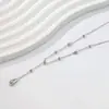 Fornecimento do fabricante: Colar Dupla Camada Gota de Ouro para Mulheres, Corrente de Clavícula Longa com Franja Tendência 2025, Peça Única Atacado