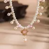 Nuevos tocados estilo chino Hanfu collar de borlas de perlas nuevo cheongsam accesorios de elemento chino antiguo venta al por mayor