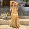 Vestido único e bonito estilo francês, estilo resort de Yunnan Dali, com uma estampa degradê deslumbrante e atmosférica e design de alça fina em linha A