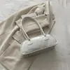 Bolso de axila 2026 otoño diseño de nicho versátil ins alta estética color liso elegante bolso de hombro popular este año para mujeres