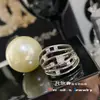 Anel Versa com linhas geométricas cruzadas e design de nicho, banhado a ouro, com zircônia microincrustada, pulseira minimalista enrolada de personalidade