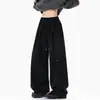 Pantalones elegantes de otoño de pierna ancha plisados con un diseño de moda, pantalones casuales rectos, pantalones holgados de estilo americano para hombre con detalles de remaches, estilo callejero