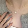 Collar combinable para mujer, diseño de nicho, cadena de clavícula de lujo ligera de alta gama, cadena de cuello con lazo, colgante para novia estudiante