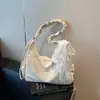 Bolso de hombro texturizado de moda transfronterizo para mujer, nuevo modelo de verano 2026, color sólido, moderno bolso tote cruzado grande de pliegues