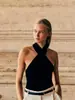Colete Tricô Ponto Cruz Europeu e Americano Verão 2026 Novo Simples Casual Versátil Gola Halter Costas Abertas Alças Finas Sem Mangas