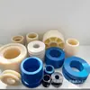 Piezas procesadas de nylon, productos de casquillos de MC nylon, ruedas de nylon, deslizadores de nylon con tierras raras que contienen aceite, piezas de plástico de nylon con formas especiales
