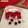 Nova Presilha de Cabelo com Bola de Pelúcia e Franja Estilo Chinês para Meninas, Doce e Festiva, Alto Apelo Estético, Acessório de Cabelo com Atmosfera de Ano Novo