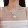 Colar estilo férias com estrela-do-mar e conchas para mulheres, novo modelo 2026, adequado para o verão, acessório de corrente para clavícula versátil e de nicho