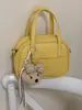 Bolsa de mão texturizada de alta qualidade para mulheres, nova bolsa de ombro da moda 2026 com padrão de lichia, bolsa transversal pequena quadrada
