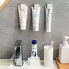 Estante de almacenamiento para pasta de dientes para baño, clip de almacenamiento para limpiador facial y pasta de dientes montado en la pared sin perforaciones, gancho de pared de almacenamiento simple para lavabo