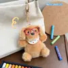Chaveiro de pelúcia de cachorro artista original fofo e calmante, pingente de boneco de apertar calmante