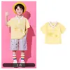 Traje de porrista para el Día del Niño para estudiantes de primaria, conjunto de uniforme de clase para el día del deporte escolar, disfraz de lunares con falda corta para jardín de infantes