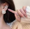 Exquisitos pendientes de perlas de alta gama y de moda. Pendientes de estilo moderno, ligeros y lujosos, dulces y fragantes. Nuevo estilo.