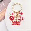 Série Dia dos Namorados Transfronteiriça Liga de Metal com Gotejamento Coração de Amor Rosa Chaveiro Pequena Bolsa de Fragrância Pingente Pequeno Pingente