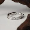 Anillo plisado texturizado de plata de ley 925 con apertura sin color de nicho, anillo sencillo con sentido avanzado transfronterizo europeo y americano.