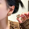 Pendientes de lujo ligeros estilo francés con diseño de lazo multiusos y cuentas, nueva colección 2026, pendientes de nicho de alta gama, accesorios versátiles