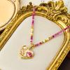 Collar Guofeng original con cuentas de perlas y piedras rosas, diseño de flor de amor, para mujer, ligero, de lujo, con cadena de clavícula de alta calidad.