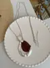 Collar Colgante de Gota de Agua Hueca Plegada de Viruta de Madera Transfronterizo Europeo y Americano, Cadena de Suéter Única, Collar de Gama Alta de Nicho