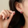 Pendientes estilo nacional chino nuevo 2024 Pendientes de botón de león rojo festivo de Año Nuevo diseño nicho pendientes de alta gama