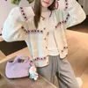 Cárdigan de punto Zeng Xiaoxian estilo coreano con bloques de color para mujer, otoño, corte holgado, adelgazante, cuello redondo, manga larga, versión corta, dulce y elegante