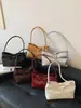 Bolso de mano con lazo de verano 2026 transfronterizo, bolso de hombro moderno y simple para el trabajo, bolso personalizado para el antebrazo