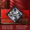 El evento de inauguración de los cinco famosos juegos de té de horno culturales y creativos del Museo del Palacio presenta regalos prácticos a clientes extranjeros.