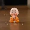 Paisagem miniatura criativa travessa quatro-não mongezinho Zen acessórios decorativos, pequena estatueta de monge para carro, desktop ou mesa de chá