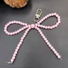 Nuevo Colgante de Lazo de Amor Plateado para Funda de Teléfono Móvil Llavero Colgante Versátil Exquisito Regalo Pequeño Accesorios para Equipaje