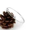 Estilo europeo y americano más vendido de acero inoxidable en espiral push-pull telescópico boca viva pulsera ajustable pulsera anillo de mano