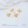 Chapado en cobre oro de 14K superficie lisa flor pequeña capullo rosa trébol de cuatro hojas trébol de tres hojas hojas dobles colgante accesorios hechos a mano para DIY