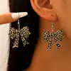 Pendientes Retro de Angora Rojo con Lazo para Mujer Otoño e Invierno, de Alta Gama, Exquisitos, Dulces y Versátiles, Pendientes de Gota de Aceite Coloridos