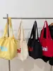 Versión Coreana Transfronteriza 2026 Verano Nuevo Bolso Tote Casual de Gran Capacidad con Estampado de Letras Ligero Estilo Perezoso Bolso de Hombro