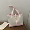 Bolso de retazos de moda para mujer, nuevo estilo 2026, elegante y de gran capacidad, versátil para ir al trabajo, bolso de hombro y bolso de mano, adecuado para ventas transfronterizas