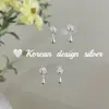 Pendientes de Diseño Minimalista y de Moda Coreanos de Plata de Ley S925 Delicados Pendientes de Gota Envueltos en Perlas de Doble Capa con un Acabado de Alta Gama