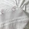 Tela de algodón jacquard hueco horizontal bordado a máquina completo directo de fábrica al por mayor para ropa primavera, verano y otoño