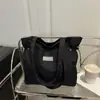 Bolsa Tote de Ombro Casual Versátil Leve e de Grande Capacidade Nova Moda Outono 2026 para Estudantes Universitários que Vão para a Aula